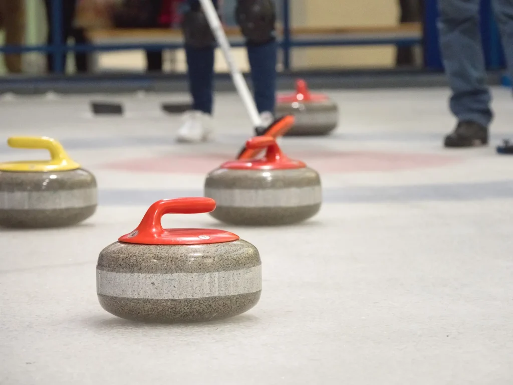 Curling stones on the ice